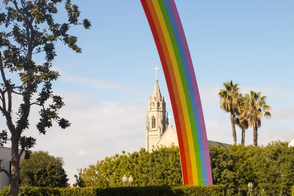 Rainbow, a public art installation by American artist Tony Tasset, rises 94 feet above Sony Pictures Studios in Culver City